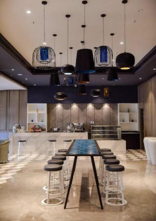 Caramel Dlf My Pad Aparthotel Лакнау Екстериор снимка